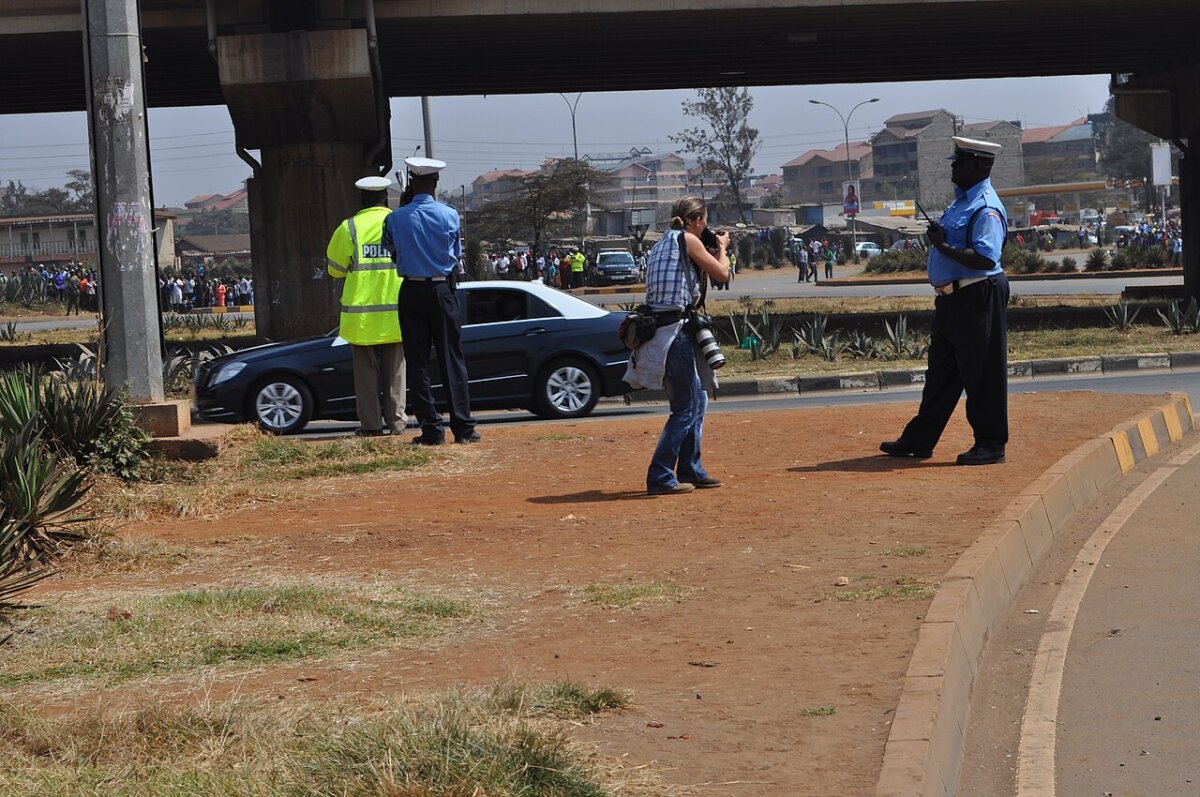 A woman in the middle of action against protesters in Nairobi.jpg